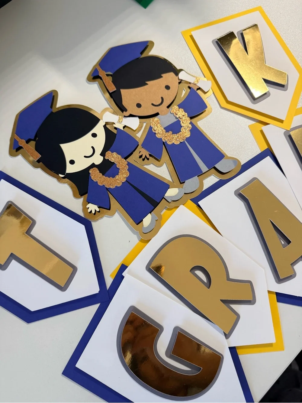 NueSol Creative festive graduation